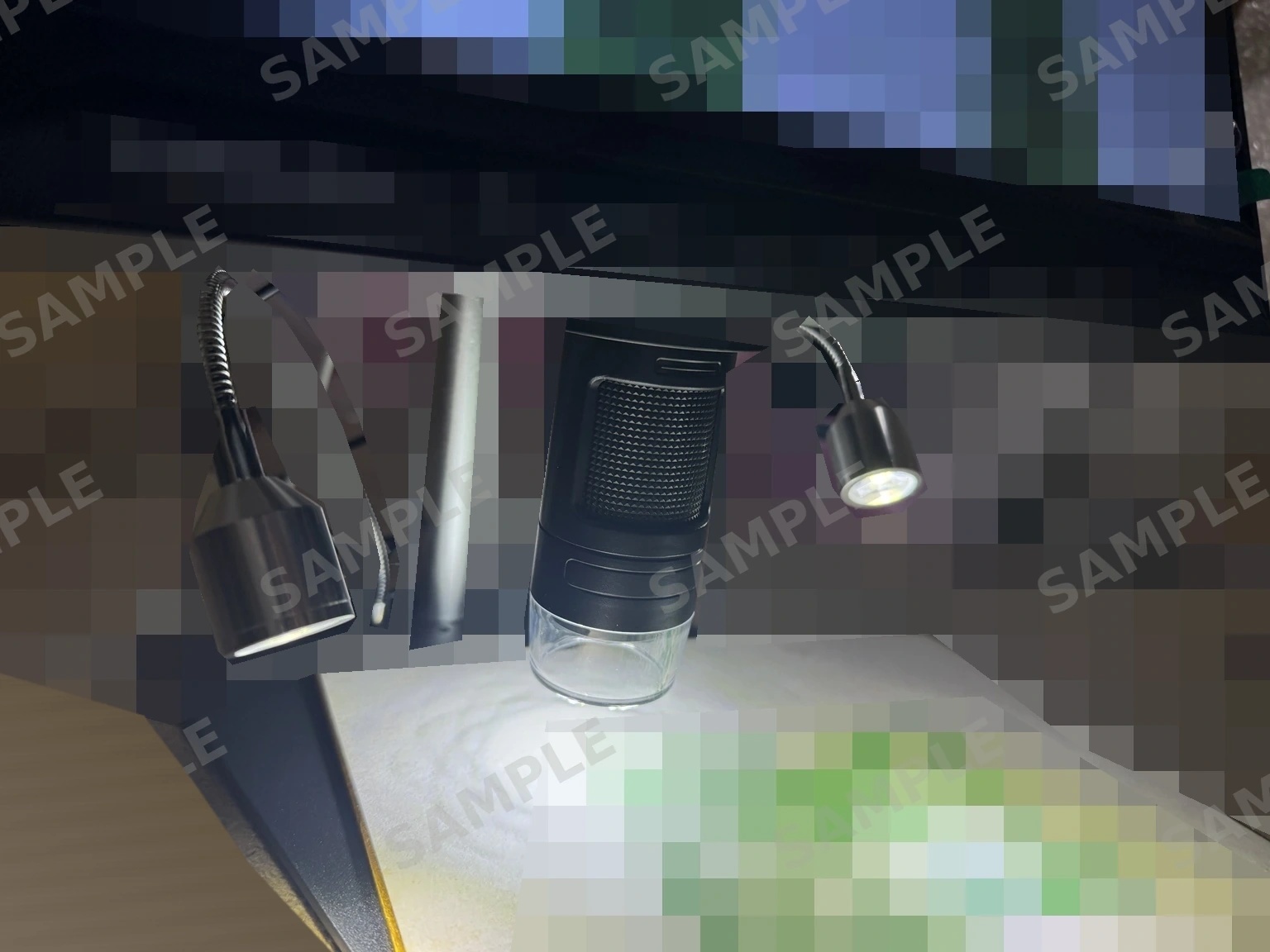 拡大検査のひとこま（情報を伏せた掲載用写真）